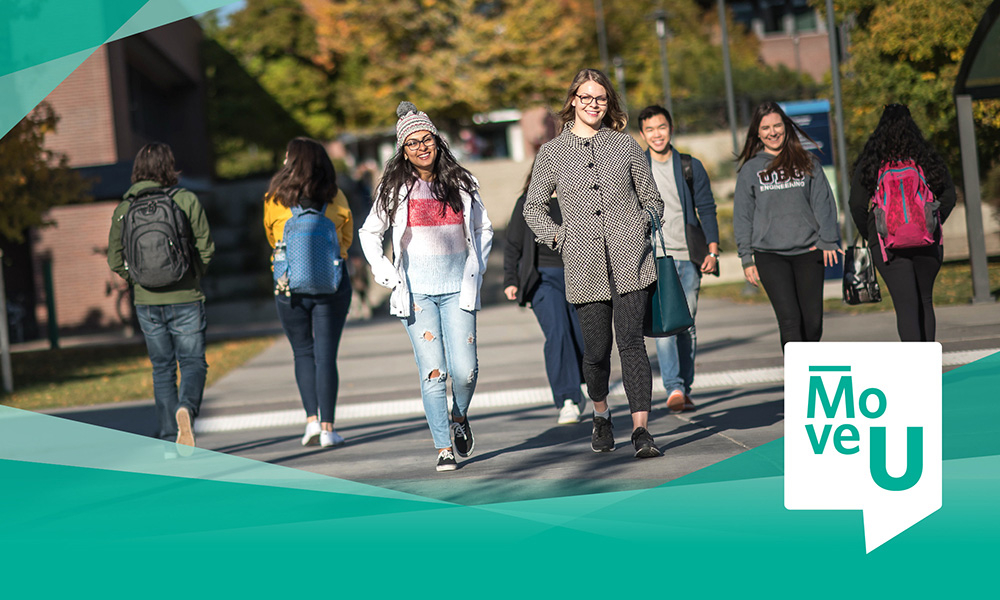 Stuents walking on UBCO campus.